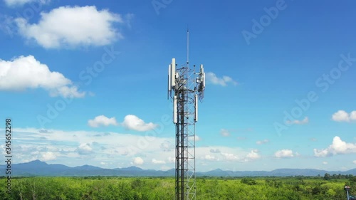 Aerial view 4k Footage of tower antennas Telecommunication cell phone, radio transmitters of cellular 5g 4g mobile and smartphones.