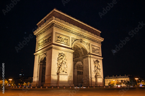 Arc de Triomphe of Paris on Charles de Gaulle Square at night
