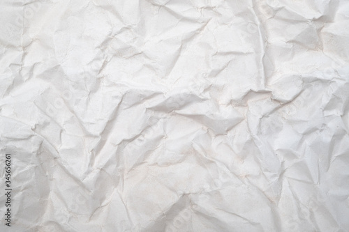 White crumpled paper texture background, apply used for wallpaper concept.