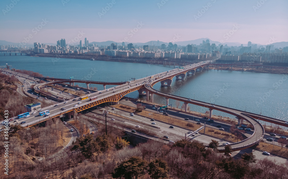 Aerial view of highway, river and skyscrapers in Seoul