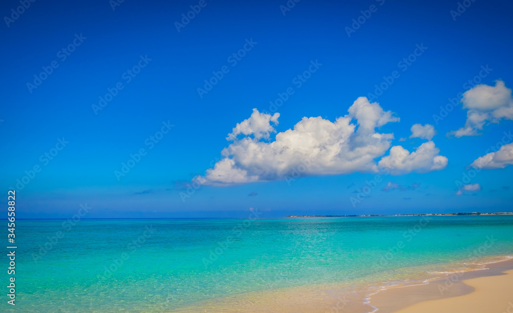 Empty Seven Mile Beach in the Caribbean during confinement, Grand Cayman, Cayman Islands Empty Seven Mile Beach in the Caribbean during confinement, Grand Cayman, Cayman Islands