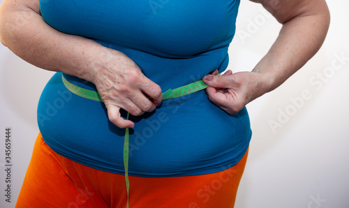 Photography Measure the waist with a centimeter tape
