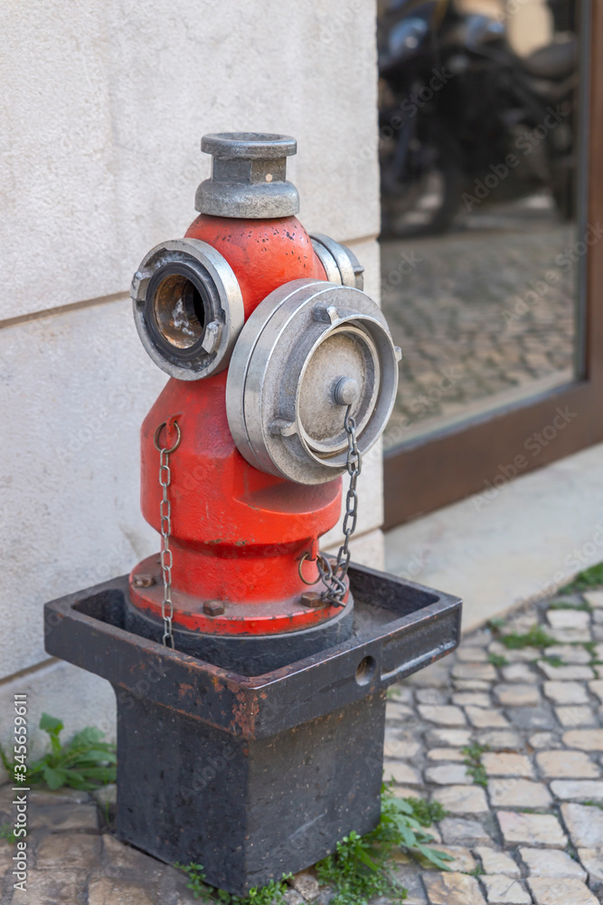 old street fire hydrant to extinguish a fire on the street of the Portuguese capital old street fire hydrant to extinguish a fire on the street of the Portuguese capital