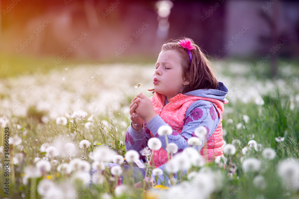 Cute little girl on the meadow in spring day Cute little girl on the meadow in spring day