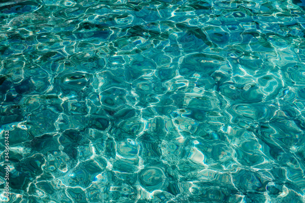 Blue water background. Emerald sea. Greece.