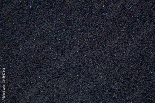 Texture of new plaster, cladding, wall covering, decorative plaster, deep black color