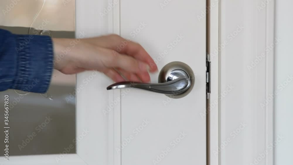 Close up of girl's hand open and close door Close up of girl's hand open and close door