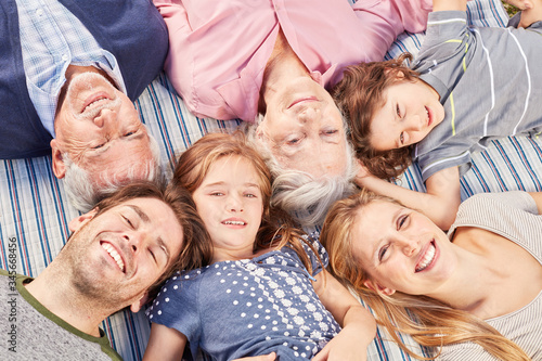 Happy family with children and grandparents