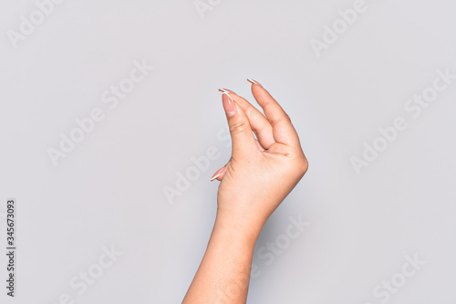 Hand of caucasian young woman snapping fingers for success  easy and click symbol gesture with hand