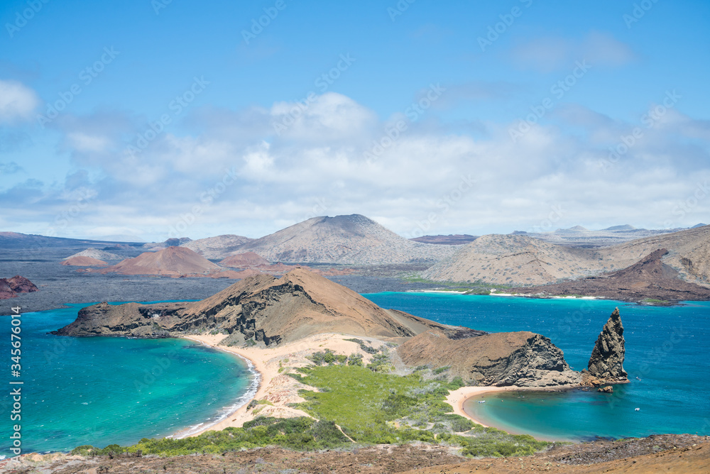 View point in Bartolome island, Galapagos, with the ocean, the bay, the beach and the famous pinnacle
