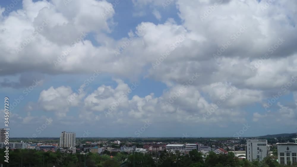 Panoramic TimeLapse of business cityscape & construction buildings with lush green tree on sunny blue sky background with white cotton candy cumulus cloud & cloudscape at sunshine day, B-roll footage Panoramic TimeLapse of business cityscape & construction buildings with lush green tree on sunny blue sky background with white cotton candy cumulus cloud & cloudscape at sunshine day, B-roll footage
