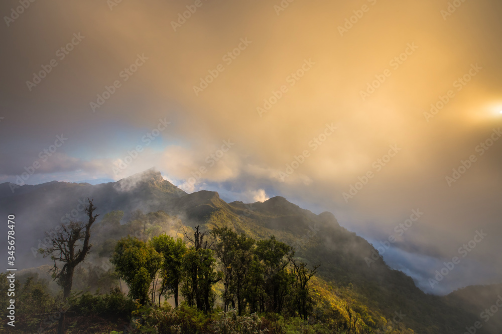 Beautiful of multiple mountains valley at sunrise in the morning at Phu chi Duen, Chiang Rai Province, Thailand Beautiful of multiple mountains valley at sunrise in the morning at Phu chi Duen, Chiang Rai Province, Thailand