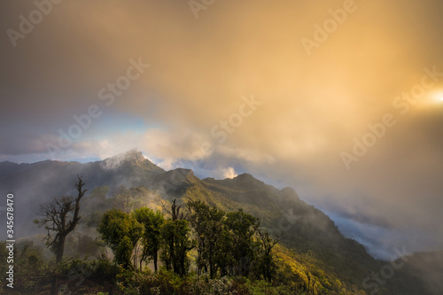 Beautiful of multiple mountains valley at sunrise in the morning at Phu chi Duen, Chiang Rai Province, Thailand photo