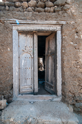 old houses wooden windows and doors in Taqah, Salalah, Oman