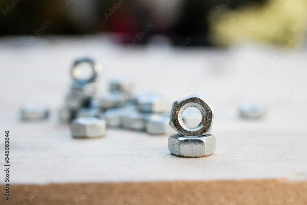 hex steel nut, industry background, stainless steel hex nut photo. industrial iron nuts nails and screw. Close-up of various steel nuts and bolts hex steel nut, industry background, stainless steel hex nut photo. industrial iron nuts nails and screw. Close-up of various steel nuts and bolts