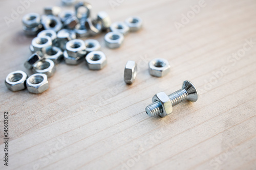 Wallpaper Mural hex steel nut, industry background, stainless steel hex nut photo. industrial iron nuts nails and screw. Close-up of various steel nuts and bolts Torontodigital.ca