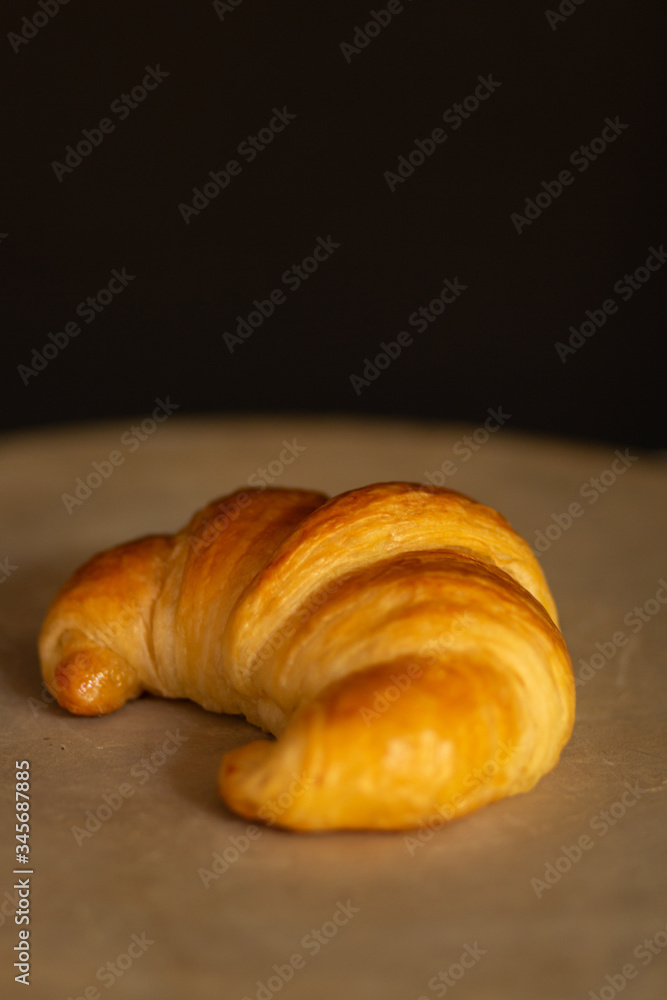 fresh croissant on a wooden table fresh croissant on a wooden table