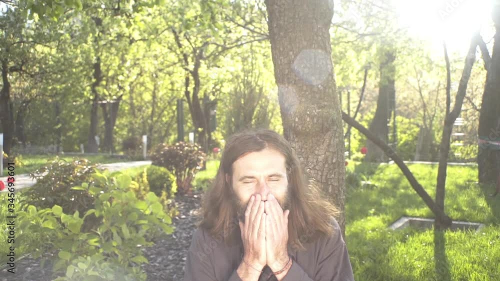 A qigong master conducts meditation using a gong and Crystal bowl, Crystal Tibetian singing bowl, a master meditates receives energy for the body A qigong master conducts meditation using a gong and Crystal bowl, Crystal Tibetian singing bowl, a master meditates receives energy for the body
