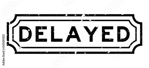 Grunge black delayed word rubber seal stamp on white background