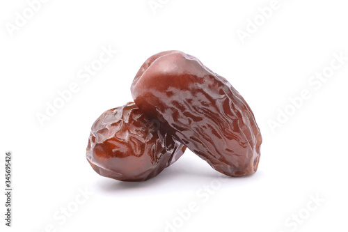 Dried date palm fruit isolated on white background with clipping path. dry fruit concept.