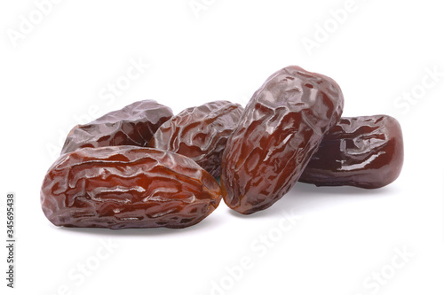 Dried date palm fruit isolated on white background with clipping path. dry fruit concept.
