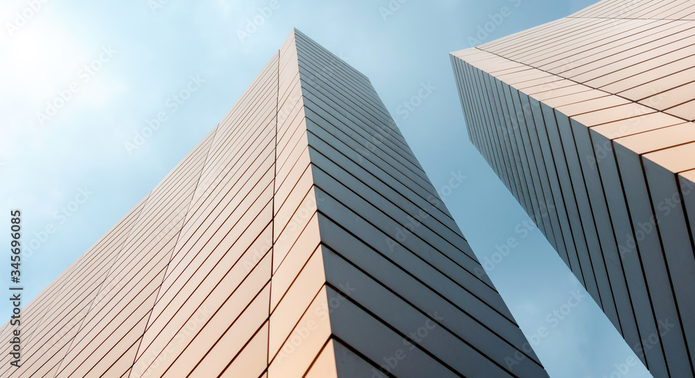 walls of a modern building against a blue sky