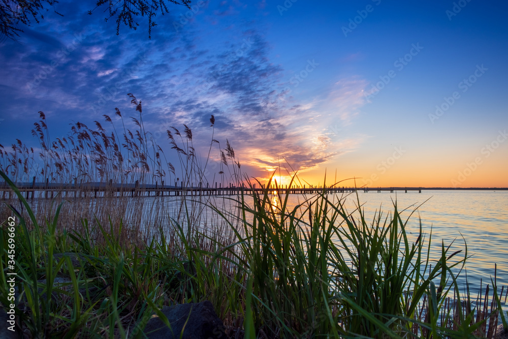 Beautiful romantic sunset over a calm lake
