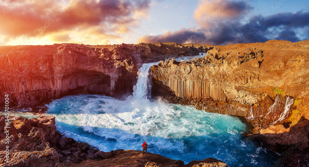 The picturesque sunset with colorful sky over volkanic landscapes and waterfalls. Sunrise on Aldeyjarfoss waterfall. Iceland, Europe. Aldeyjarfoss waterfall at sunset. Fantastic Icelandic Scenery