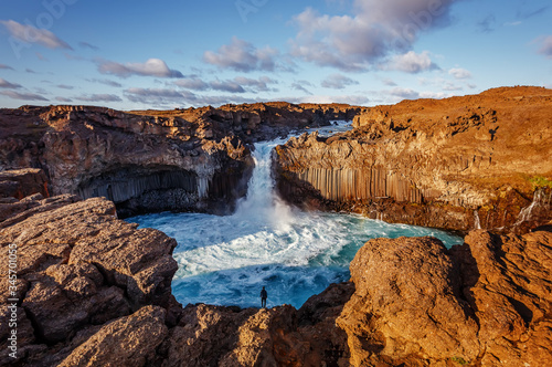 Wonderful Sunny landscape of Iceland. The breathtaking landscape of Aldeyjarfoss waterfall  in North-Iceland.  Icelandic summer scenery. Amazing nature in Iceland, Awesome tourist attraction. photo