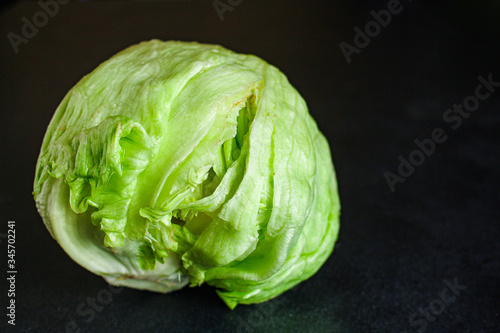 iceberg leaves  lettuce green freshness. Menu concept food background, keto or paleo diet. top view. copy space for text