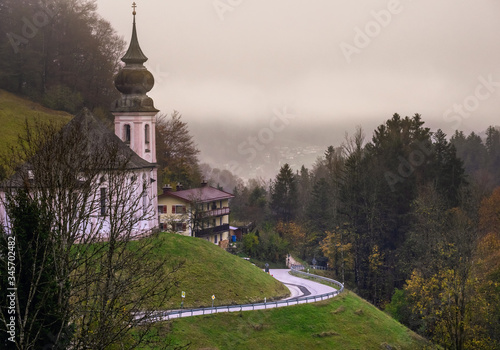 Overcast foggy autumn morning and Maria Gern church,  Berchtesgaden,  Germany photo