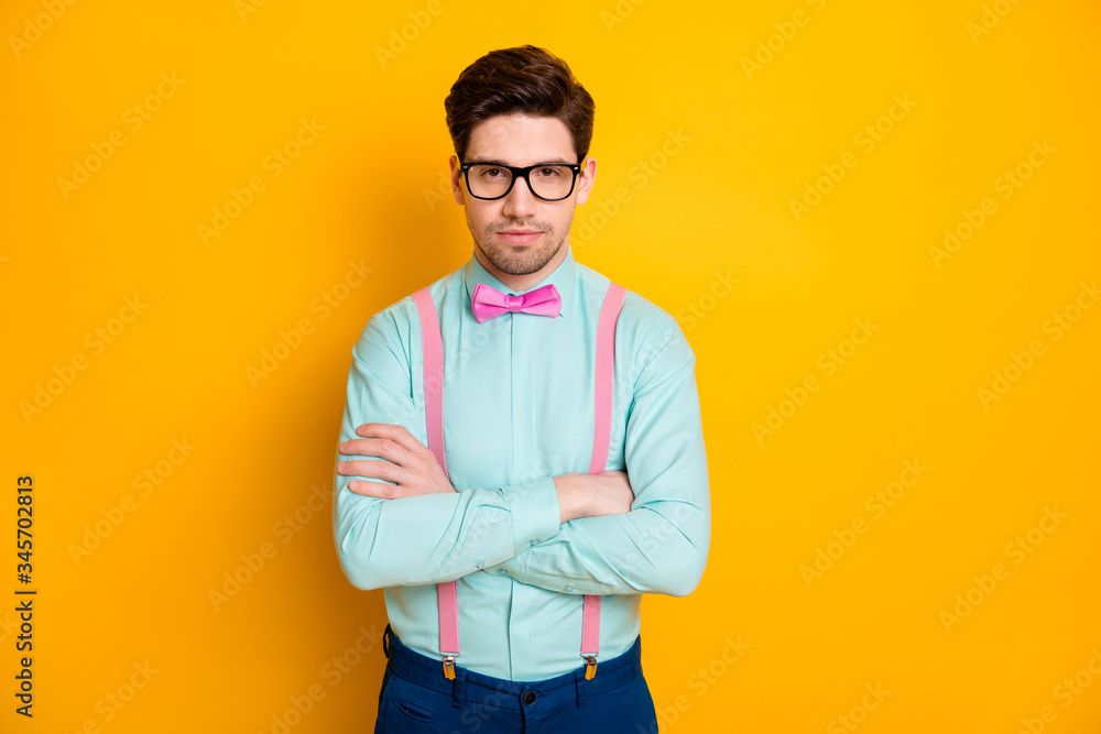Portrait of brutal charming work worker man cross hands ready decide decisions wear stylish clothes isolated over vibrant color background Portrait of brutal charming work worker man cross hands ready decide decisions wear stylish clothes isolated over vibrant color background