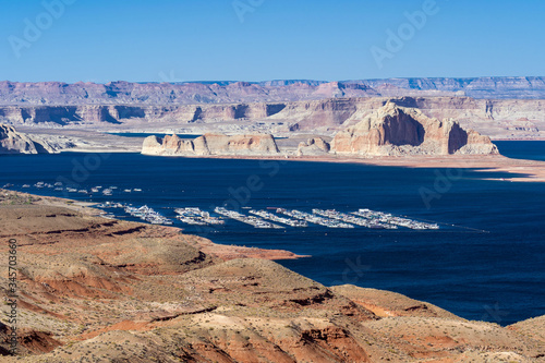 Lake Powell in desert Landscape and yacht Marinas recreation center at Page city Arizona, United States. USA Landmark environmental water resources reservoir sport and recreation concept.
