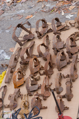 Illegal poacher traps and equipment metal on flea market in Ukraine.
