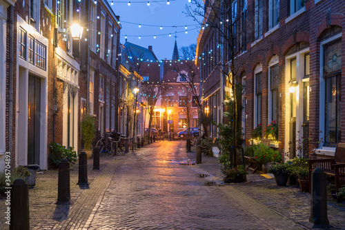 Night view of street in Haarlem, Netherlands photo