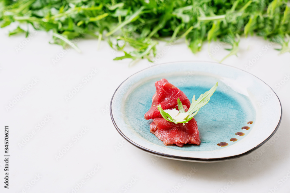 Marbled beef carpaccio. Marbled beef carpaccio.