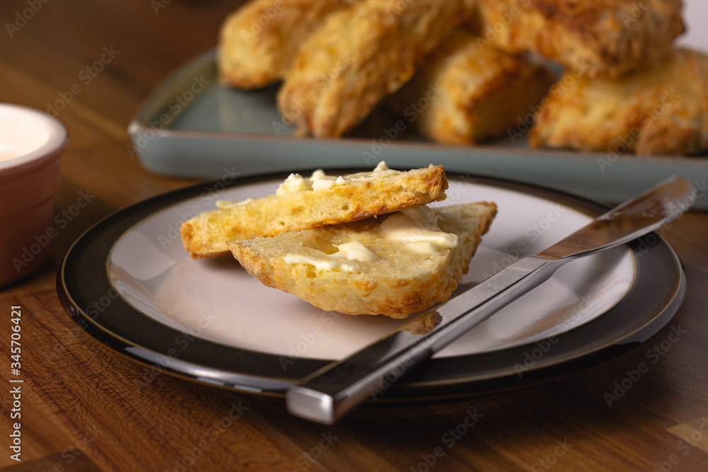 Cheese scones with butter close up