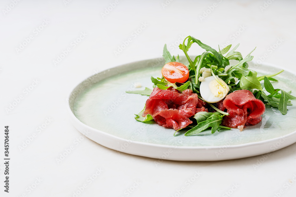 Marbled beef carpaccio. Marbled beef carpaccio.