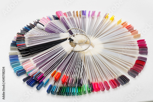 Wallpaper Mural Multi-colored samples of nail tips for nail design on light background Torontodigital.ca