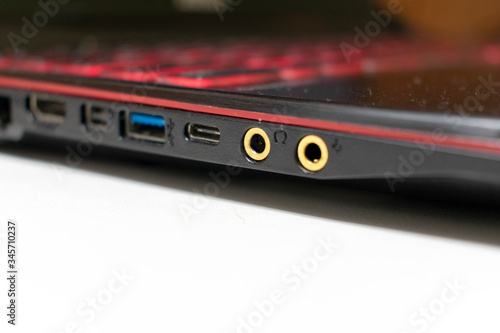 close up of a computer headphone port