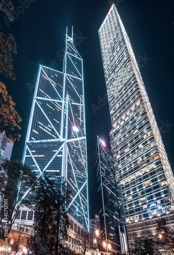 Futuristic night  view on skyscrapers include Bank of China photo