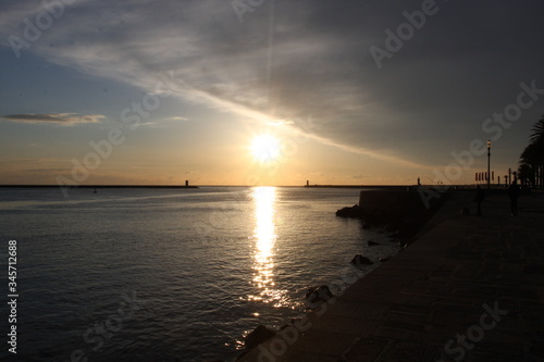 Fototapeta Naklejka Na Ścianę i Meble -  Sunset at the ocean, silhouettes, natural colors