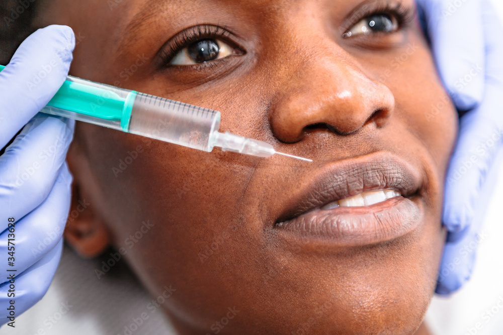 Cosmetic beauty injection to beautiful woman face Cosmetic beauty injection to beautiful woman face