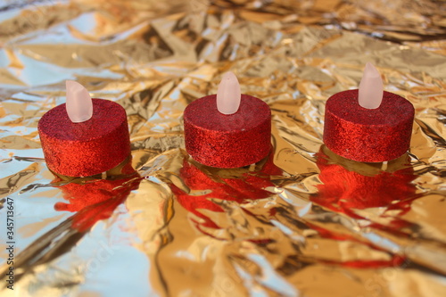 Three round flat top artificial candles