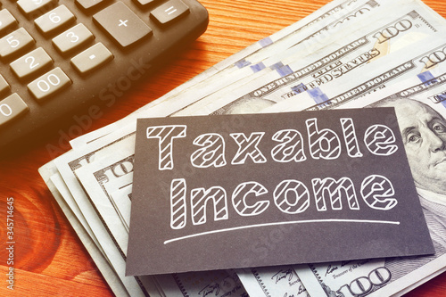 Taxable Income is shown on the conceptual business photo photo