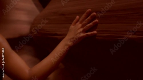 A hand stroking the interior walls of Upper Antelope, Utah. United States