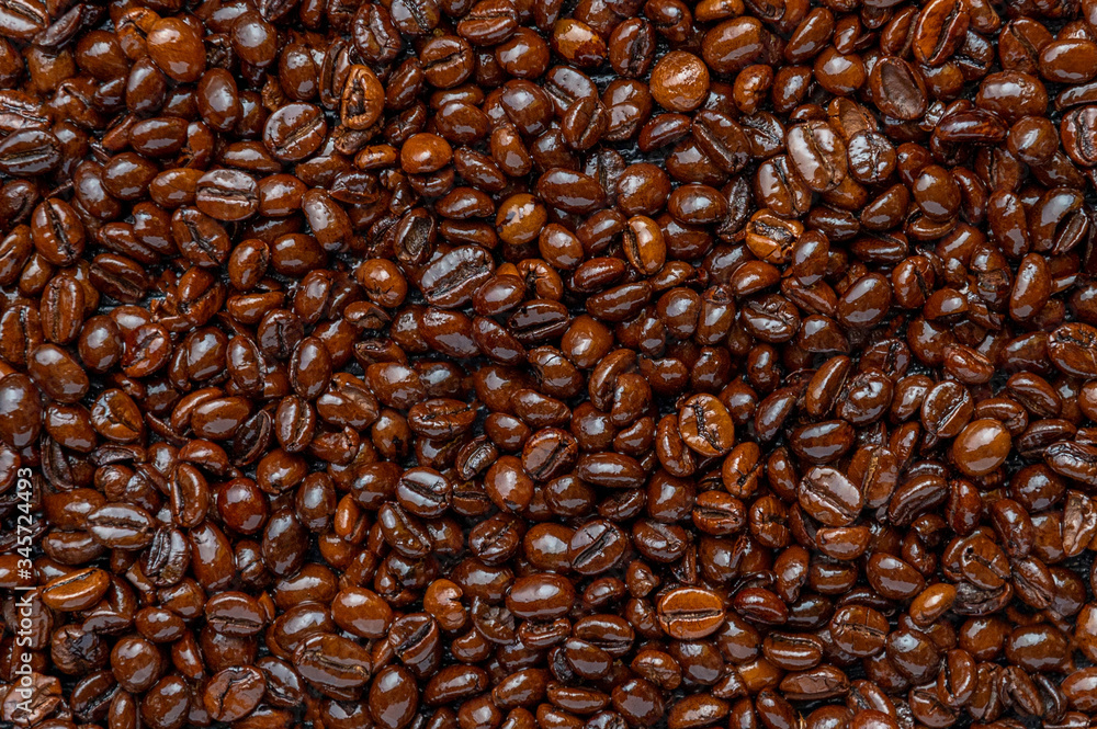 Obraz premium Roasted coffee beans closeup background.