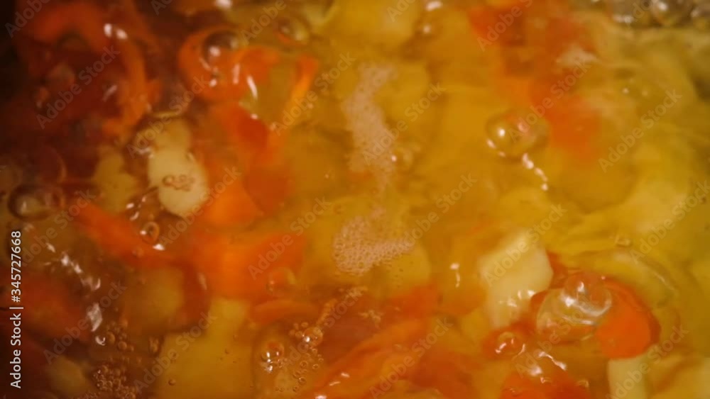 Vegetable soup. Vegetables in boiling water. Potatoes, carrots, onions, peas. Cooking vegetable soup. Vegetable soup. Vegetables in boiling water. Potatoes, carrots, onions, peas. Cooking vegetable soup.