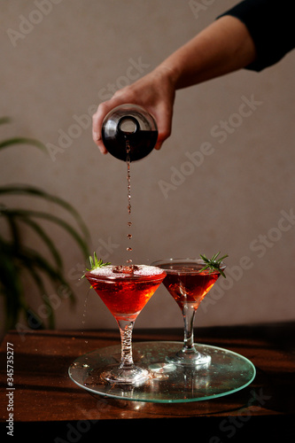 Red wine coctails with ice and rosemarine
