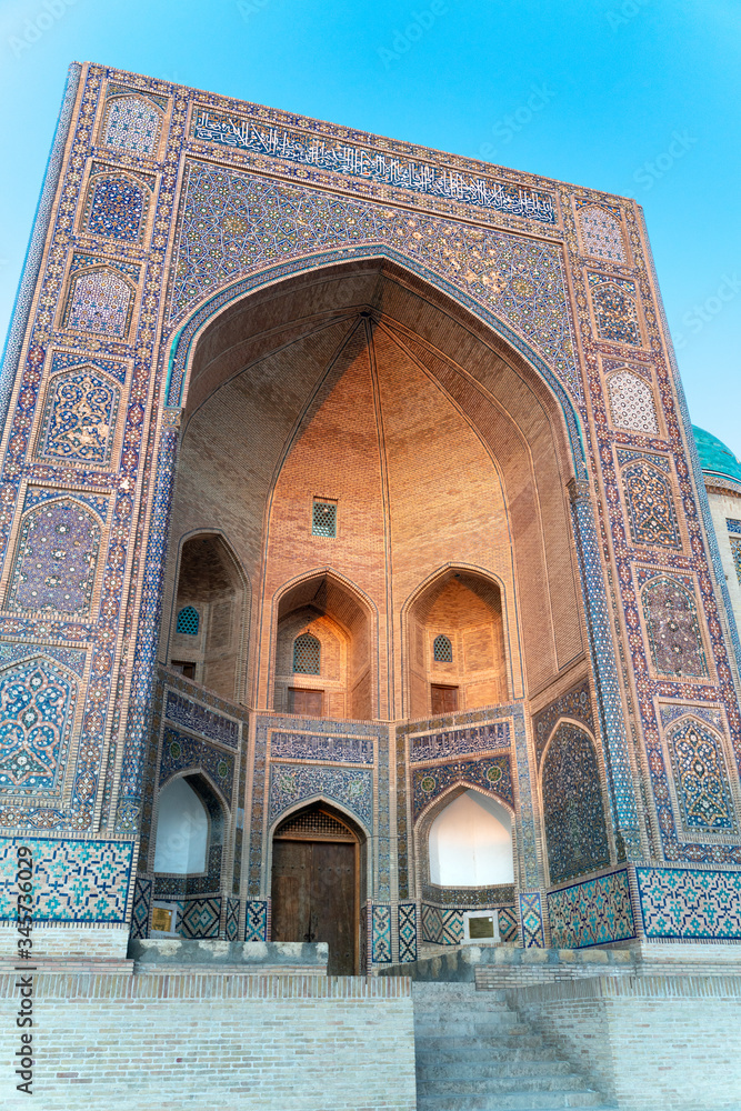 The main entrance and gate of Mir Arab madrasasi in Bukhara